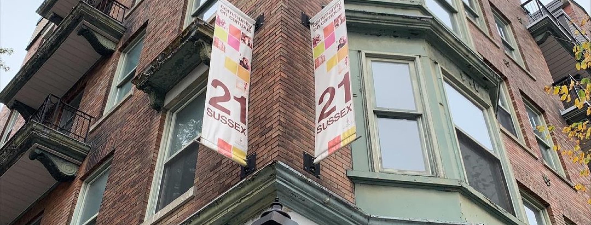 21 Sussex banners outside the building.
