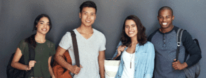 Four students smiling