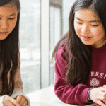 Two female students doing homework