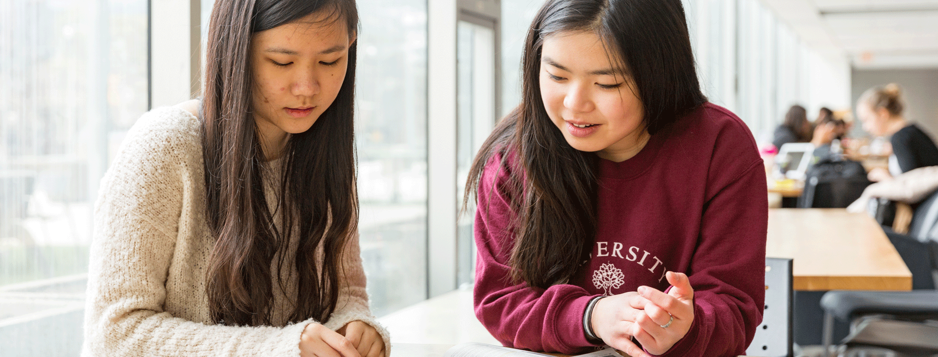 Two female students doing homework