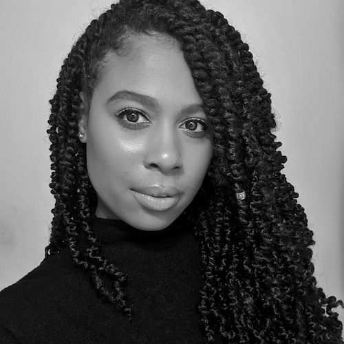 Black and white photo of Jheanelle Anderson wearing a black turtleneck.