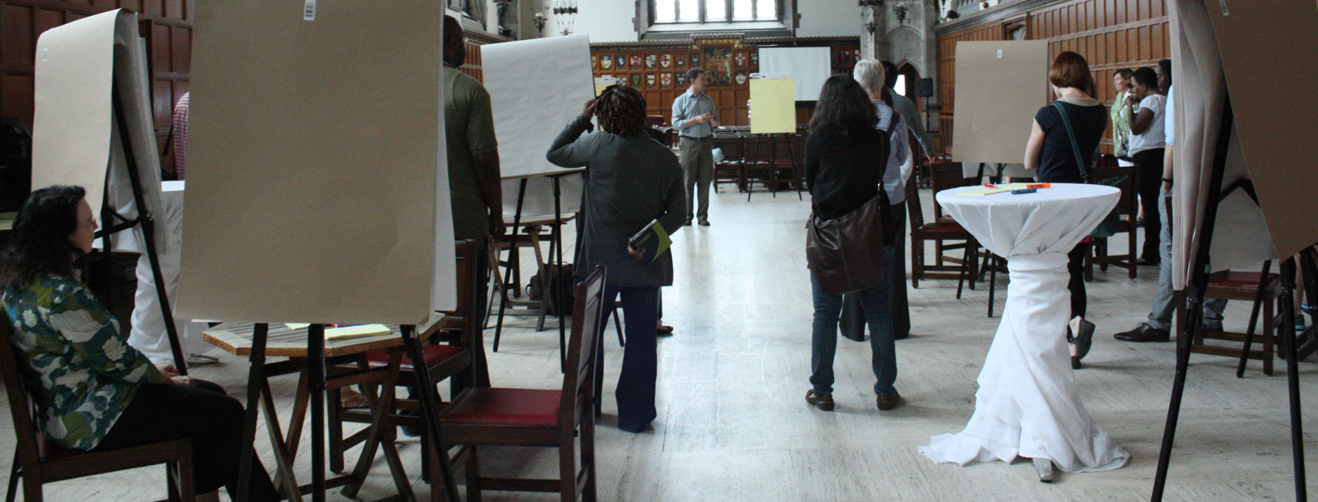 Group of faculty attending seminar in Hart House Great Hall