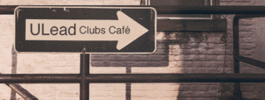 Directional arrow with ULead Clubs Cafe on it