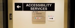 Accessibility Services sign outside of office on the fourth floor of 455 Spadina Avenue.