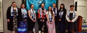 Graduating Indigenous students smiling.