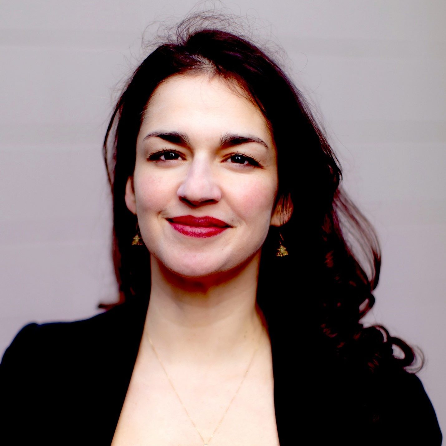 Headshot of Dr Nisha Toomey.