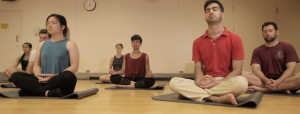 Group of students meditating