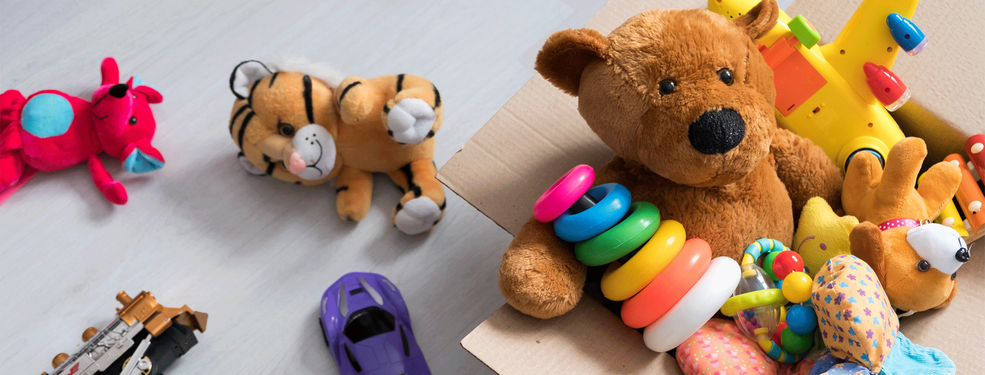 A pile of toys including a couple of cute teddy bears