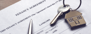 Tenant agreement with a key ring and pen