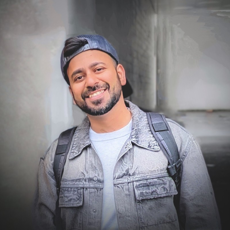 Headshot of Rohitash smiling.