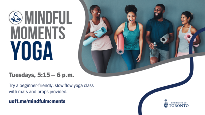 Students with yoga mats in line before a yoga class.