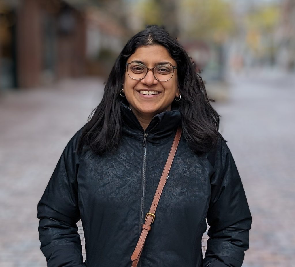 Headshot of Dr. Susitna smiling.