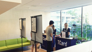 A couple of students at a pop up TCard hub