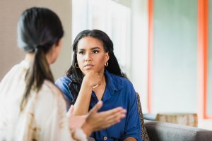 Therapist listens attentively to client